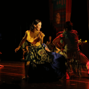 Dancer in yellow patterned dress