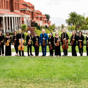 New Century Chamber Orchestra standing in a line