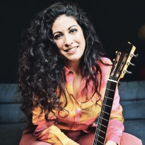 Gaëlle Solal sitting with guitar